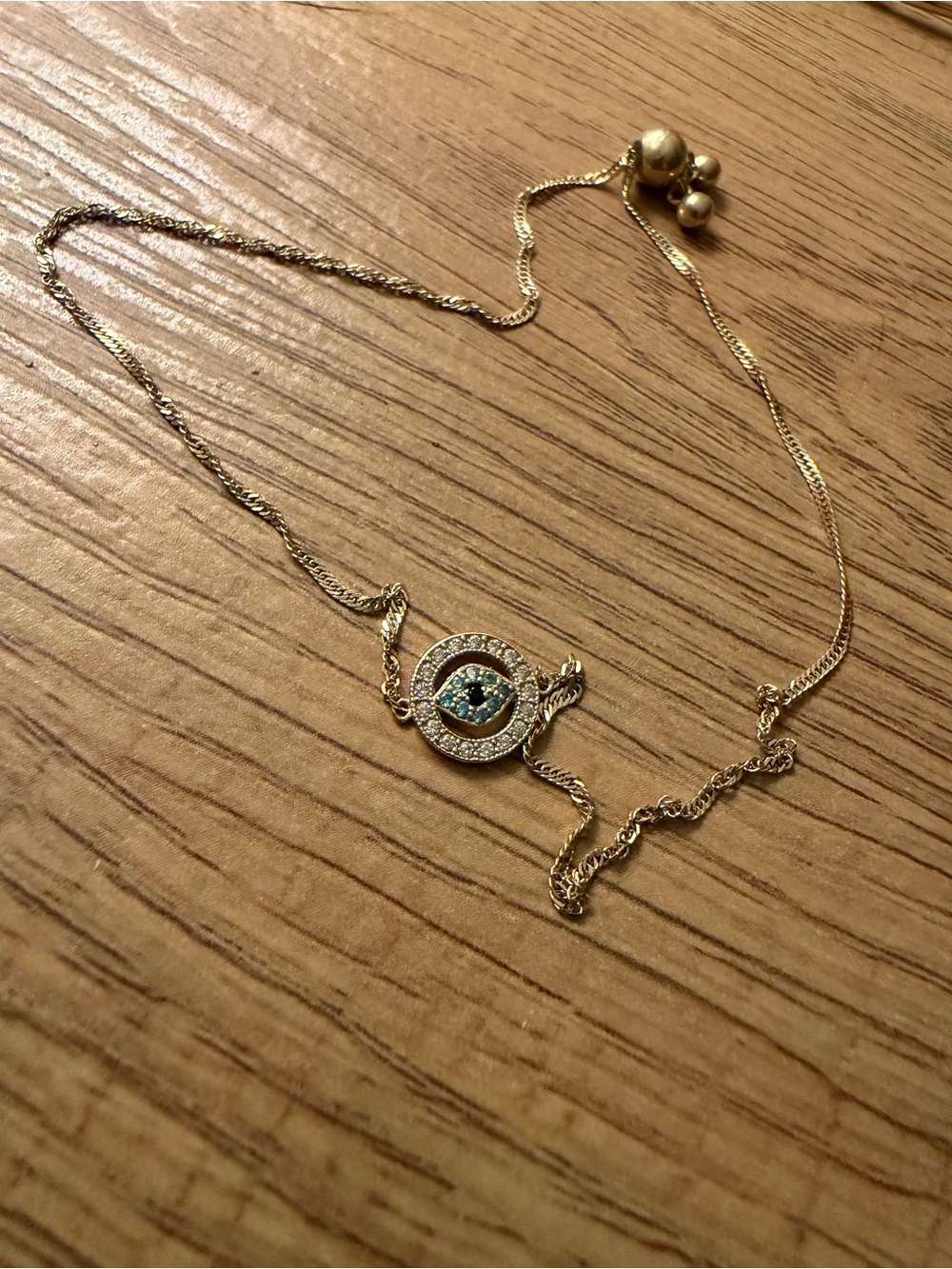 Solid Gold Evil Eye Pendant Bracelet with Blue Accent